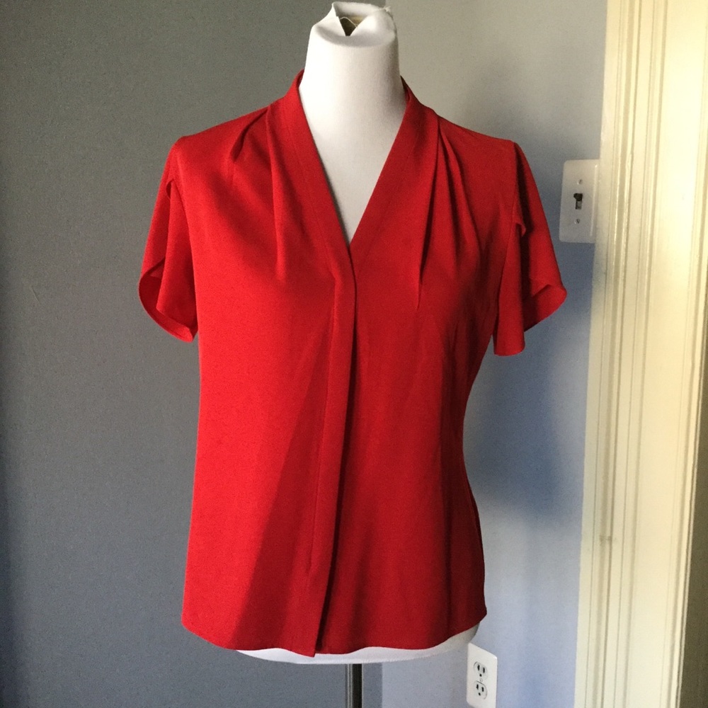 Versatile red blouse by Calvin Klein